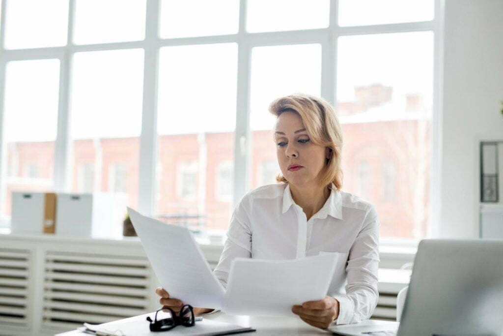 a woman sitting at a desk