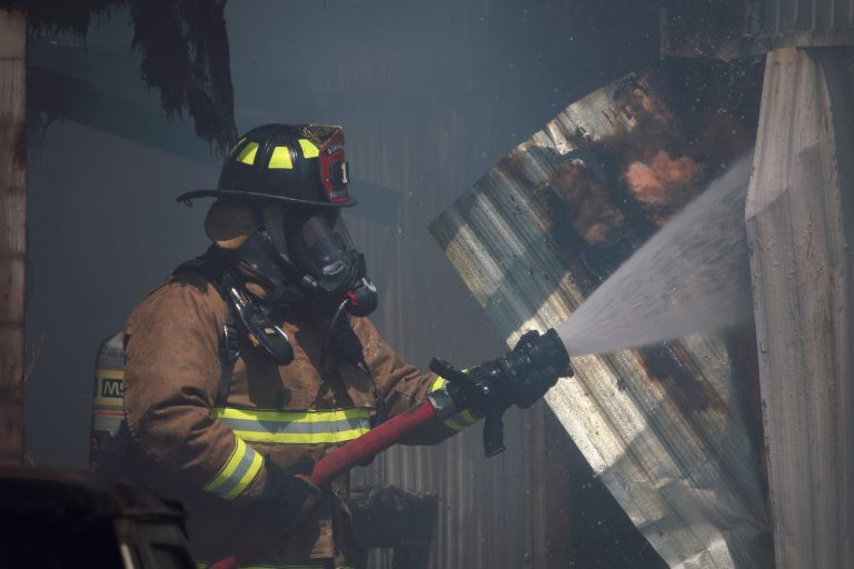 a firefighter putting out a fire
