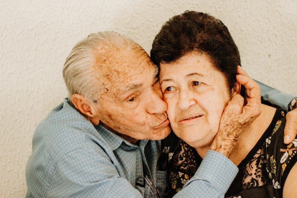 a man and a woman smiling