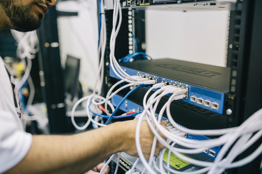 a person holding a computer