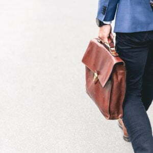 a person holding a purse