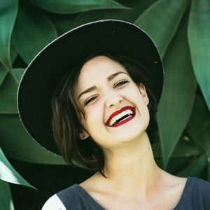 a woman smiling with her mouth open