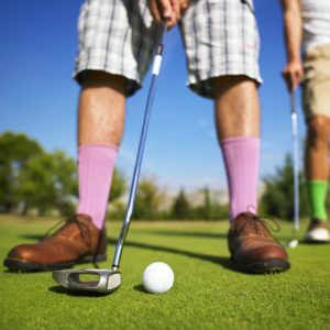 a person playing golf