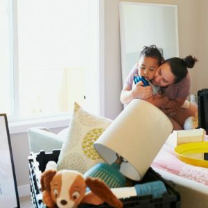 a person holding a baby