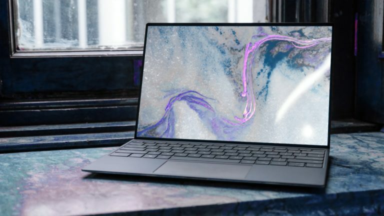a laptop with a colorful design on the screen