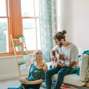 a man and a woman playing a video game
