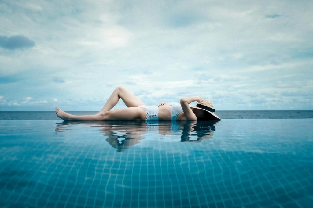 a person lying on a beach